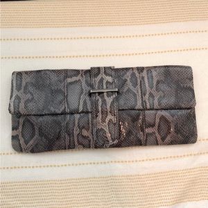Synthetic leather clutch